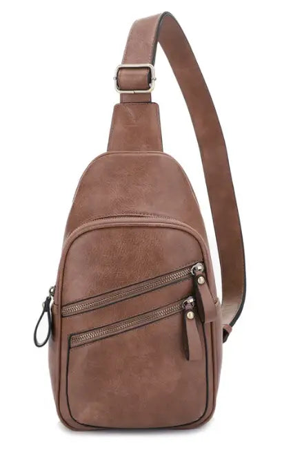 JESSIE & JAMES JEANNIE CONCEALED CARRY 2 POCKET SLING BAG 12.5 H X 7.5 W X 3.5 D ( TAUPE )