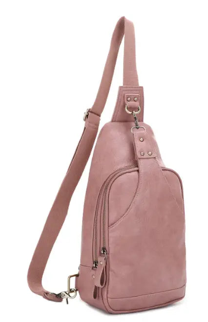 JESSIE & JAMES BROOKE CANVAS CONCEALED CARRY SLING BAG 15 H X 8 W X 3.5 D ( MAUVE )